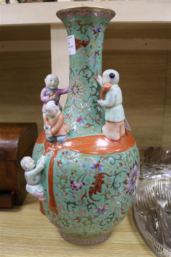 A Chinese green ground Boys vase